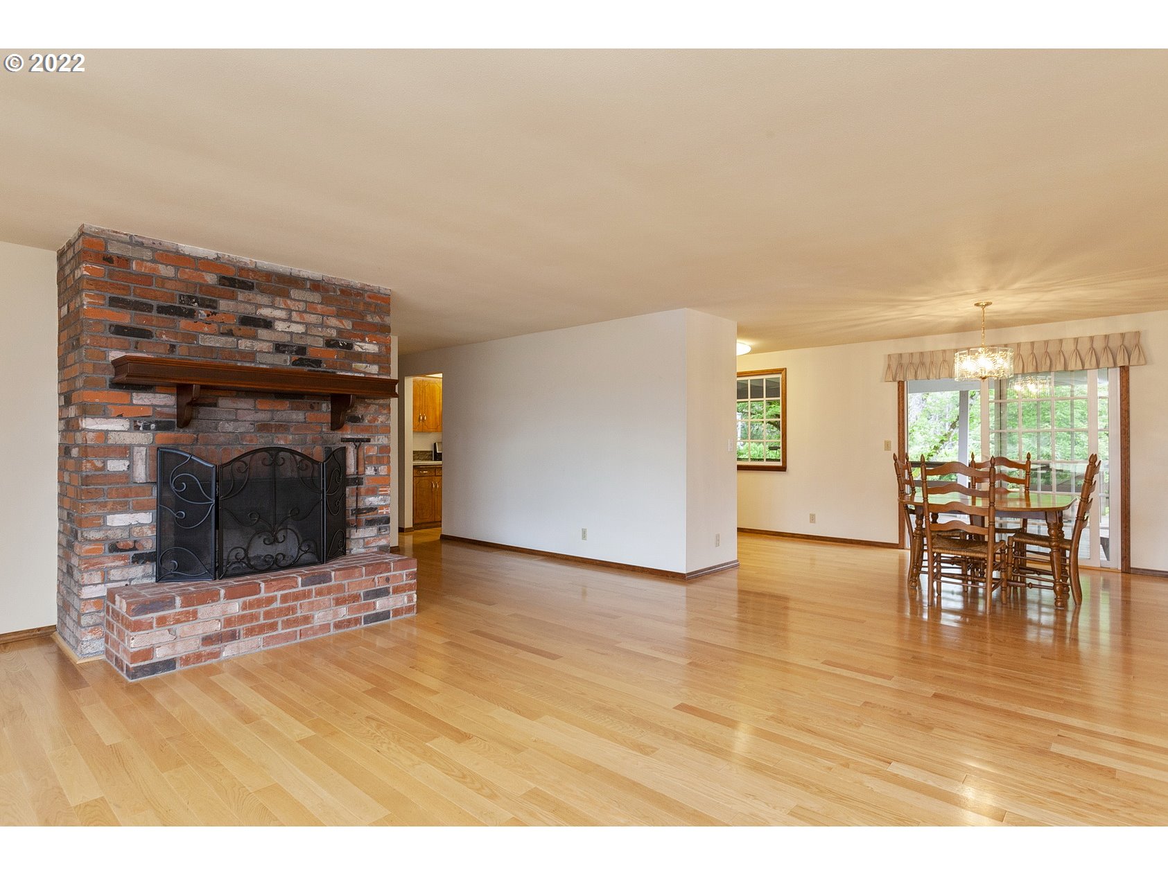 16190 South Wilson Road Oregon City, OR 97045 - Photo 8 of 32 a view of a livingroom with furniture and a fireplace