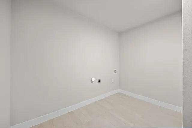 a backyard of a house with trampoline