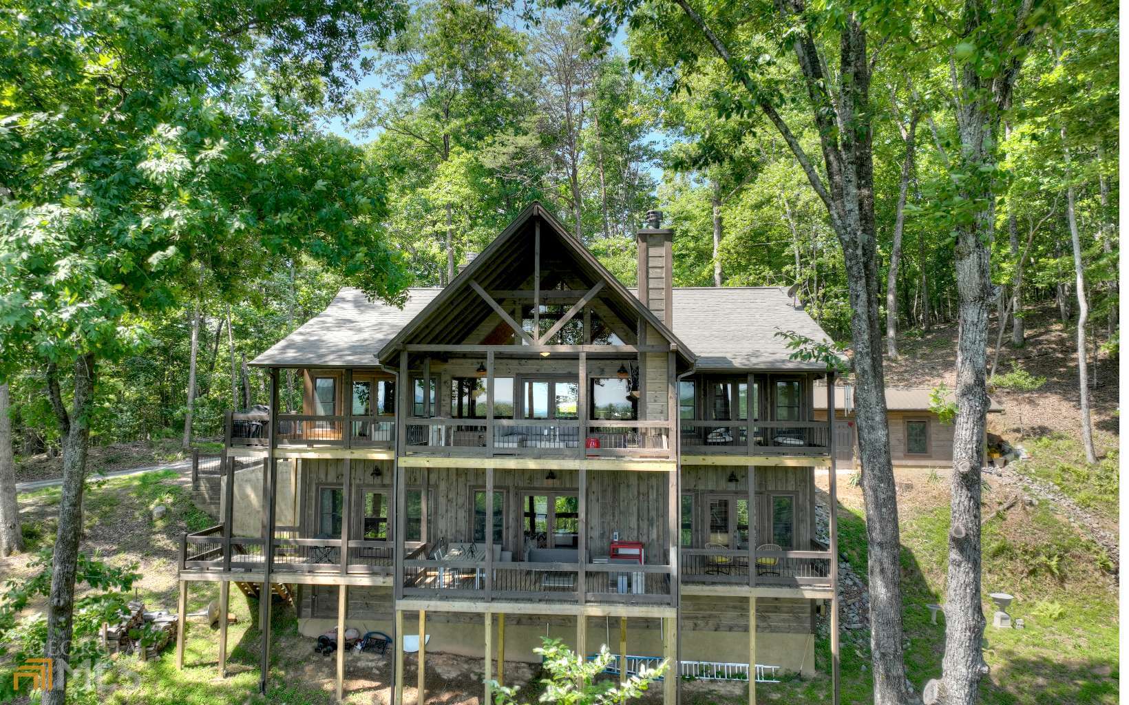 262 Bell Camp Ridge Road, Unit 1 Blue Ridge, GA 30513 - Photo 1 of 1 front view of a house with a small yard