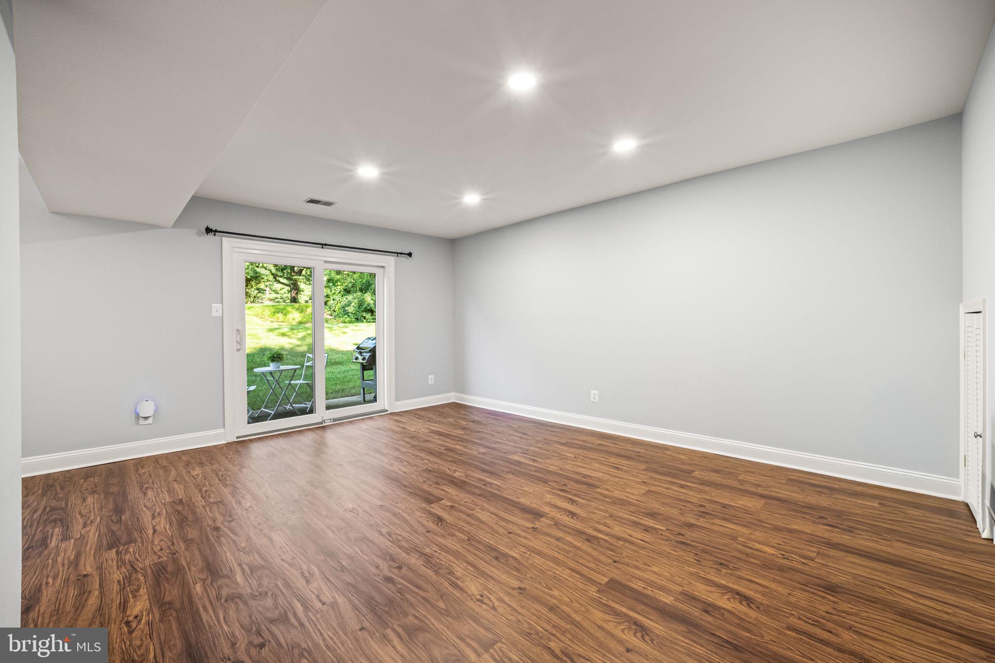 402 Danor Court Chesterbrook, PA 19087 - Photo 10 of 30 Family Room with sliding glass doors to Patio