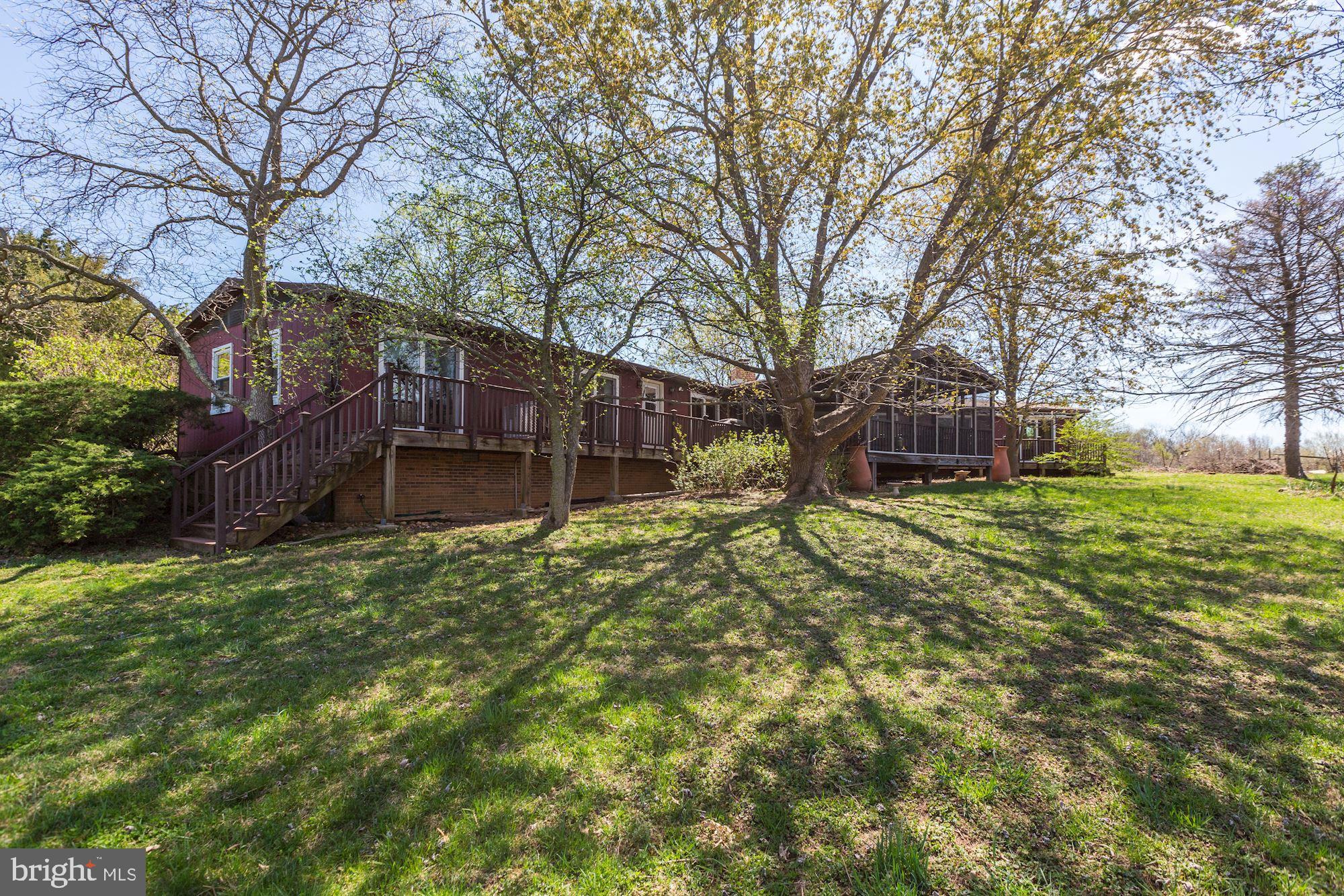 23500 Whites Ferry Road Dickerson, MD 20842 - Photo 3 of 42 Rear screened porch with panoramic views