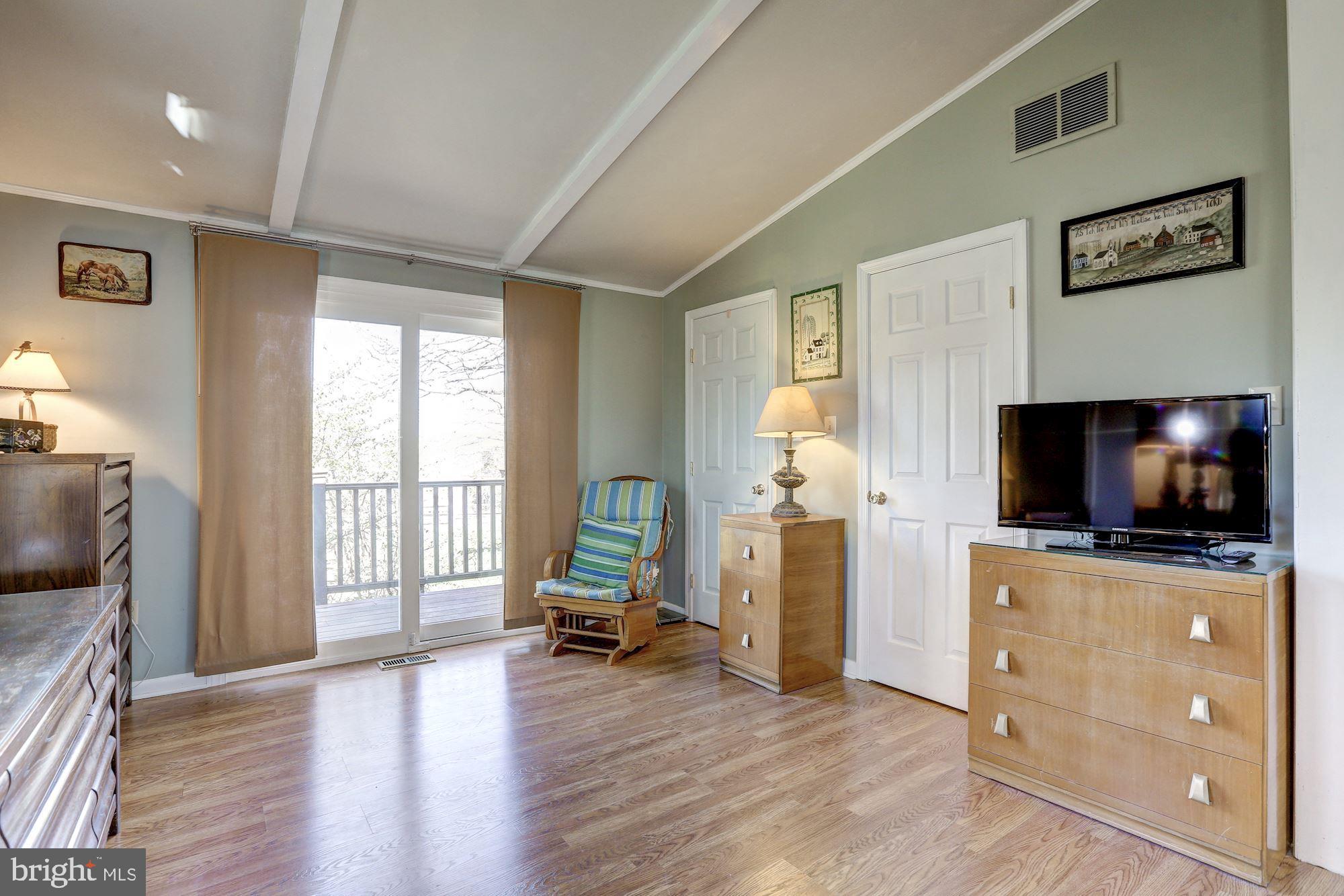 23500 Whites Ferry Road Dickerson, MD 20842 - Photo 23 of 42 Master bedroom with access to deck