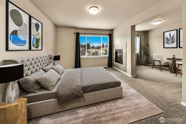 a bedroom with a bed and glass walk in closet