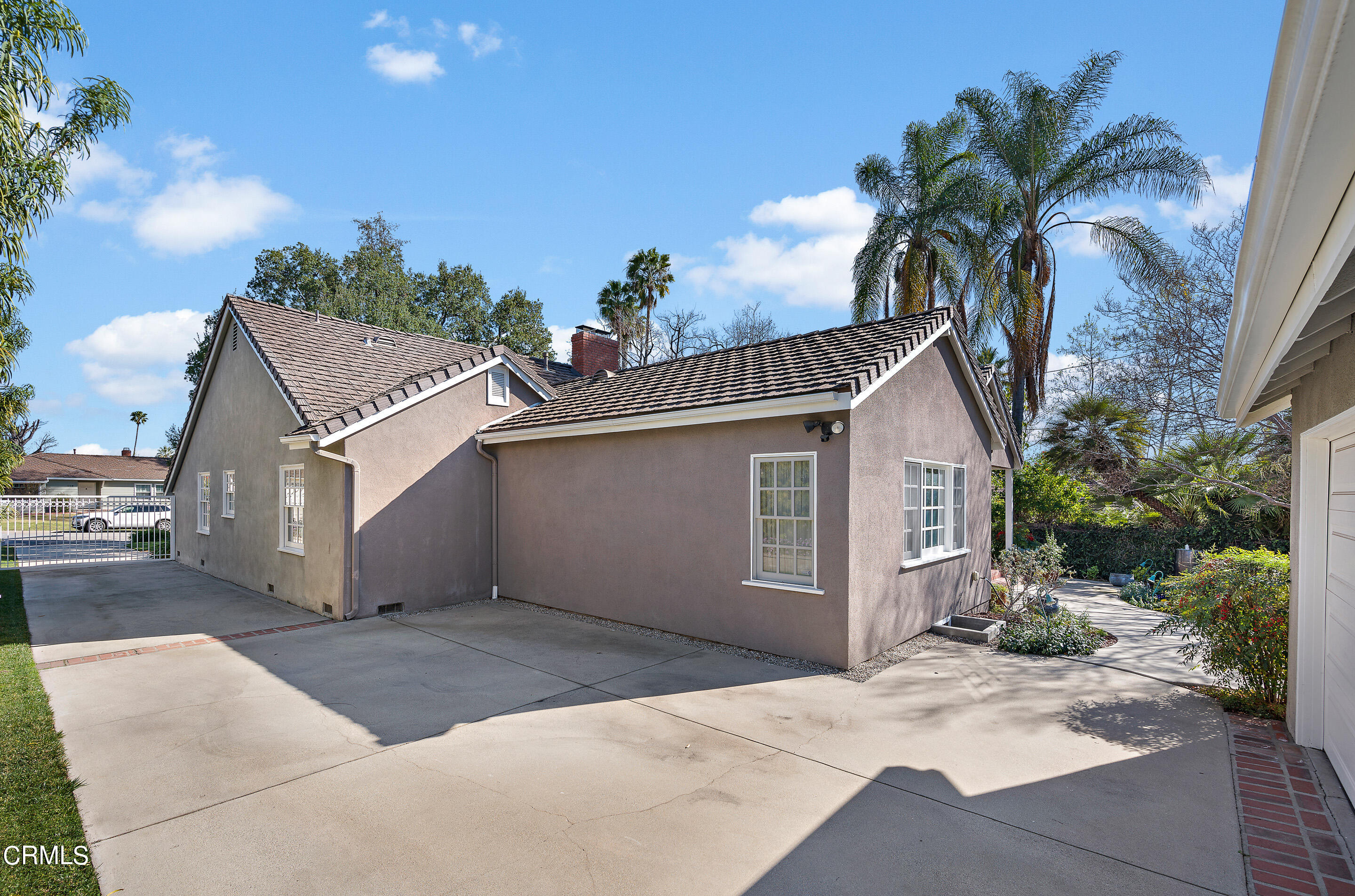 411 Monte Vista Road Arcadia, CA 91007 - Photo 46 of 49 a view of a house with a yard and potted plants