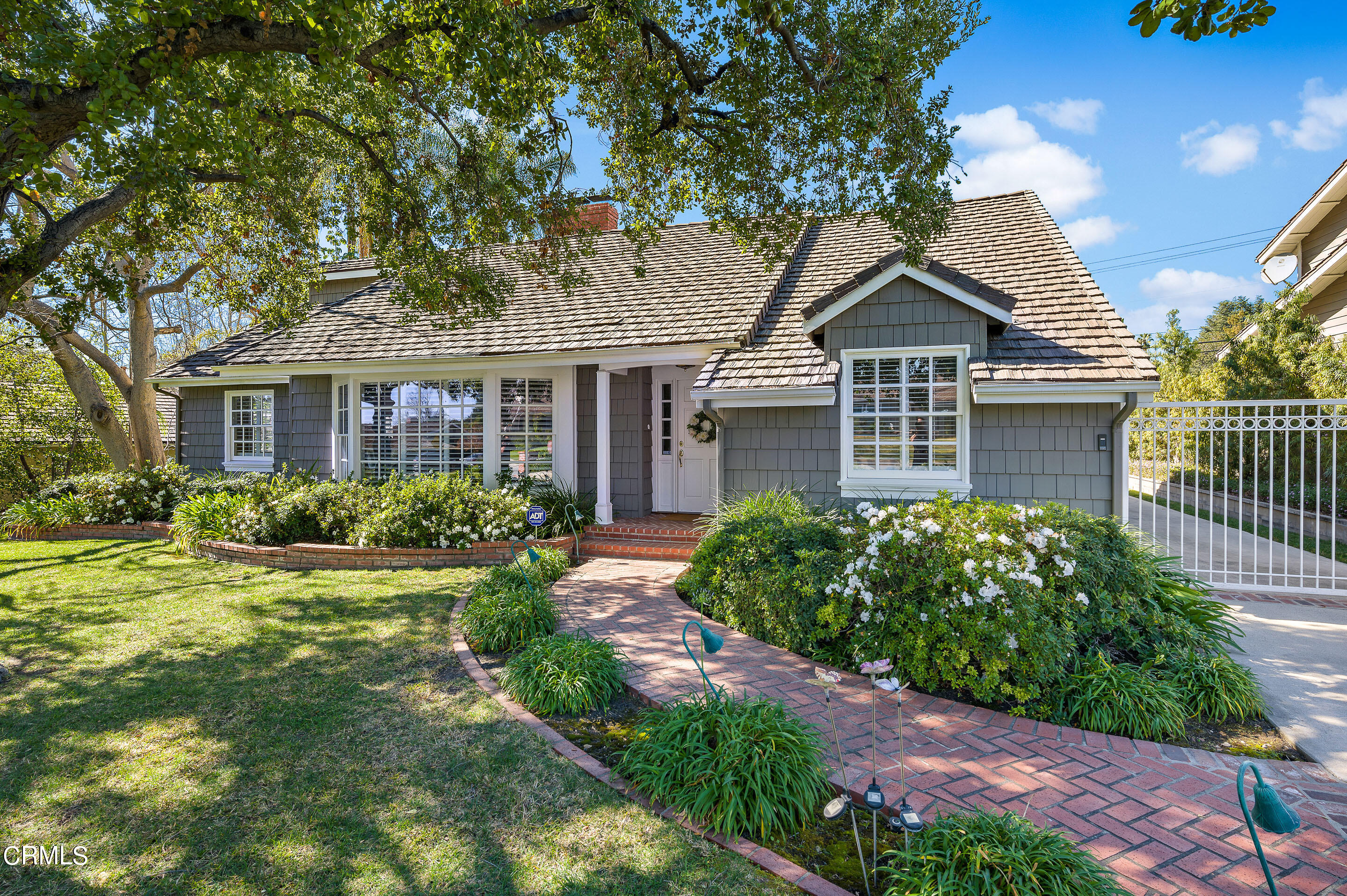 411 Monte Vista Road Arcadia, CA 91007 - Photo 6 of 49 a front view of a house with a garden