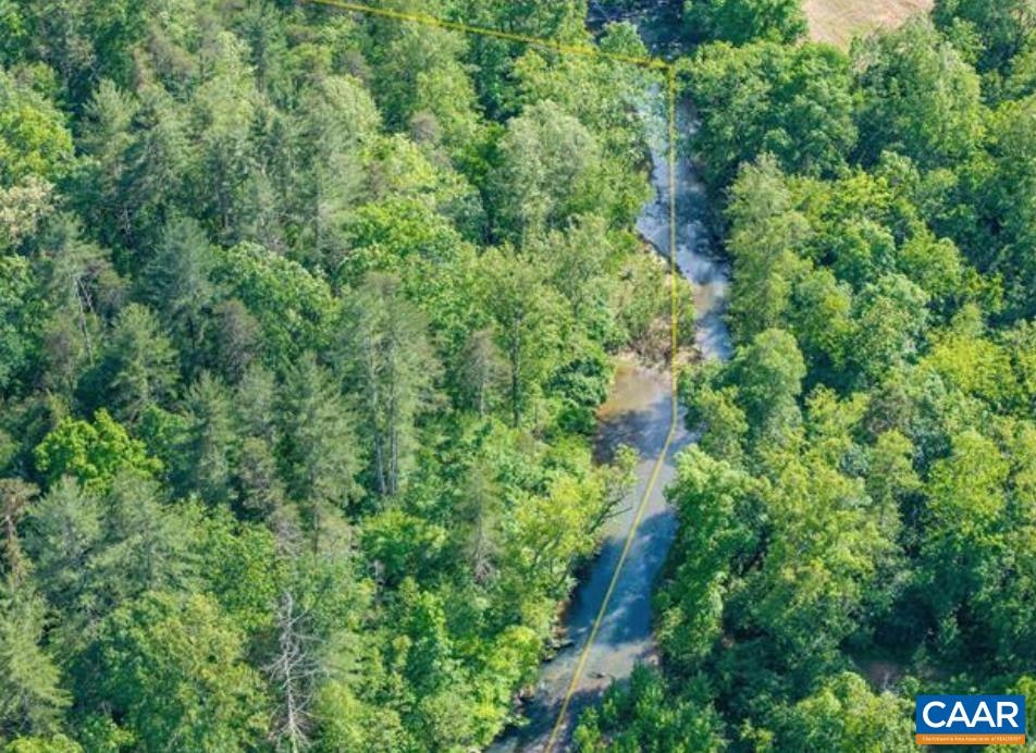 0 Chapman Road Stanardsville, VA 22973 - Photo 2 of 5 an aerial view of residential house with outdoor space and trees all around