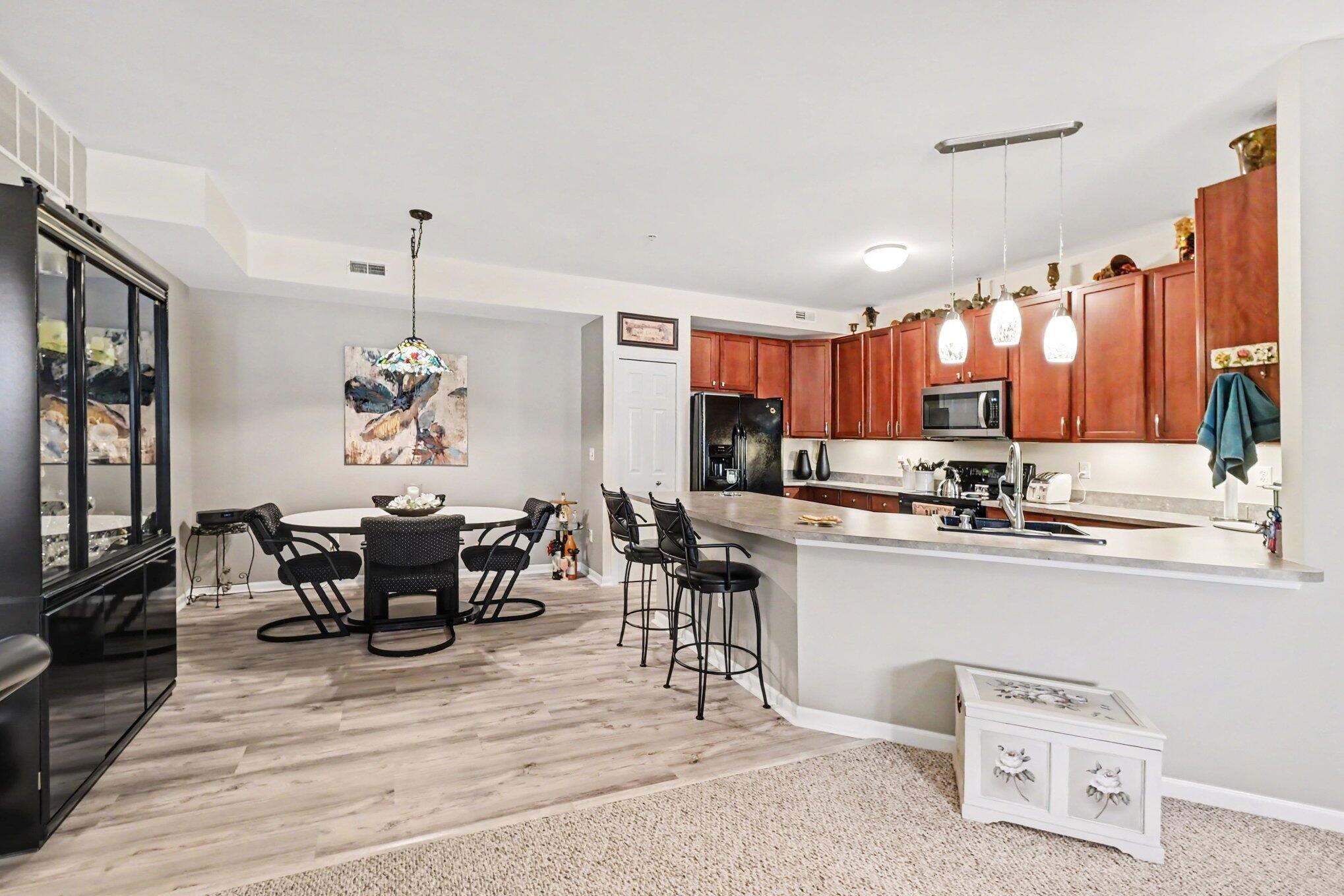 10122 Ridge Run Street Howell, MI 48855 - Photo 11 of 27 dining area/Kitchen