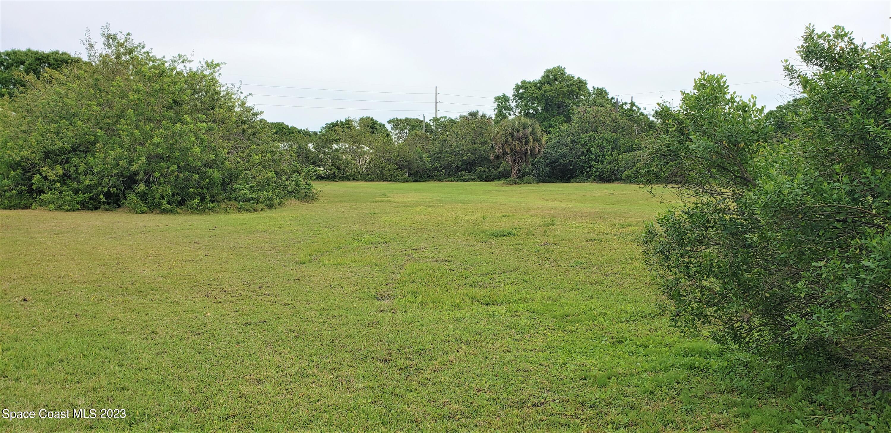 0 Wilson Lane Malabar, FL 32950 - Photo 7 of 16 a view of a field with an outdoor space