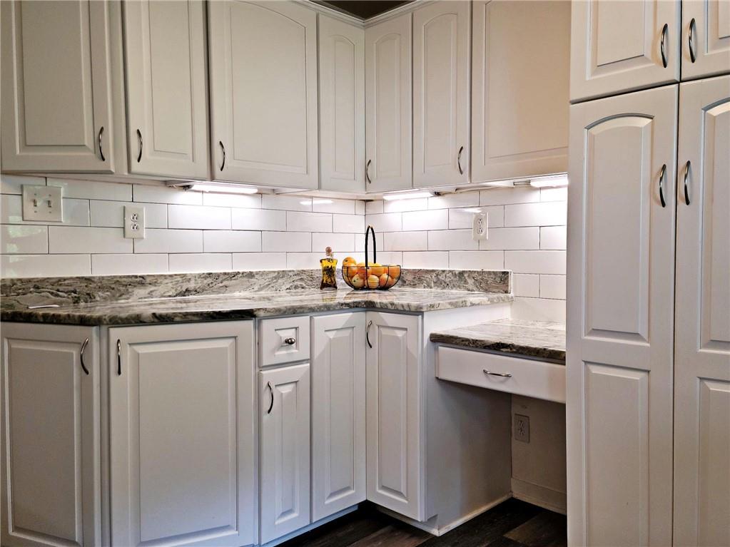 5184 Richland Road Gibsonia, PA 15044 - Photo 8 of 23 a kitchen with stainless steel appliances granite countertop a sink stove and cabinets