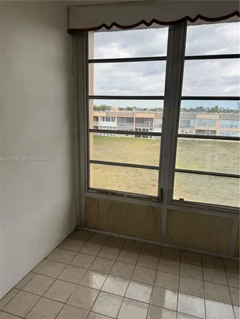 a view of entryway with a front door