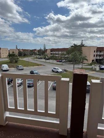 a view of a park with palm trees