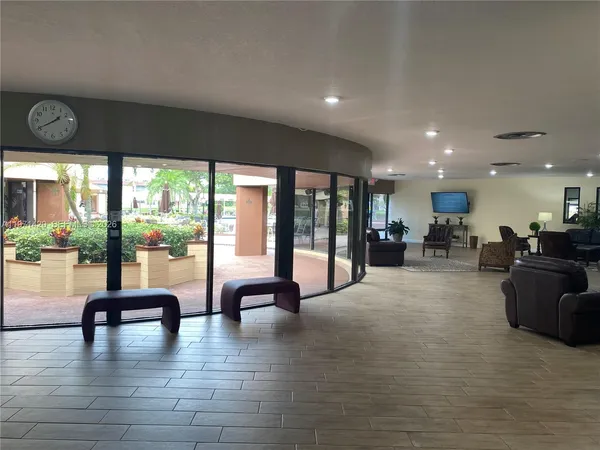 a kitchen with a table and chairs in it