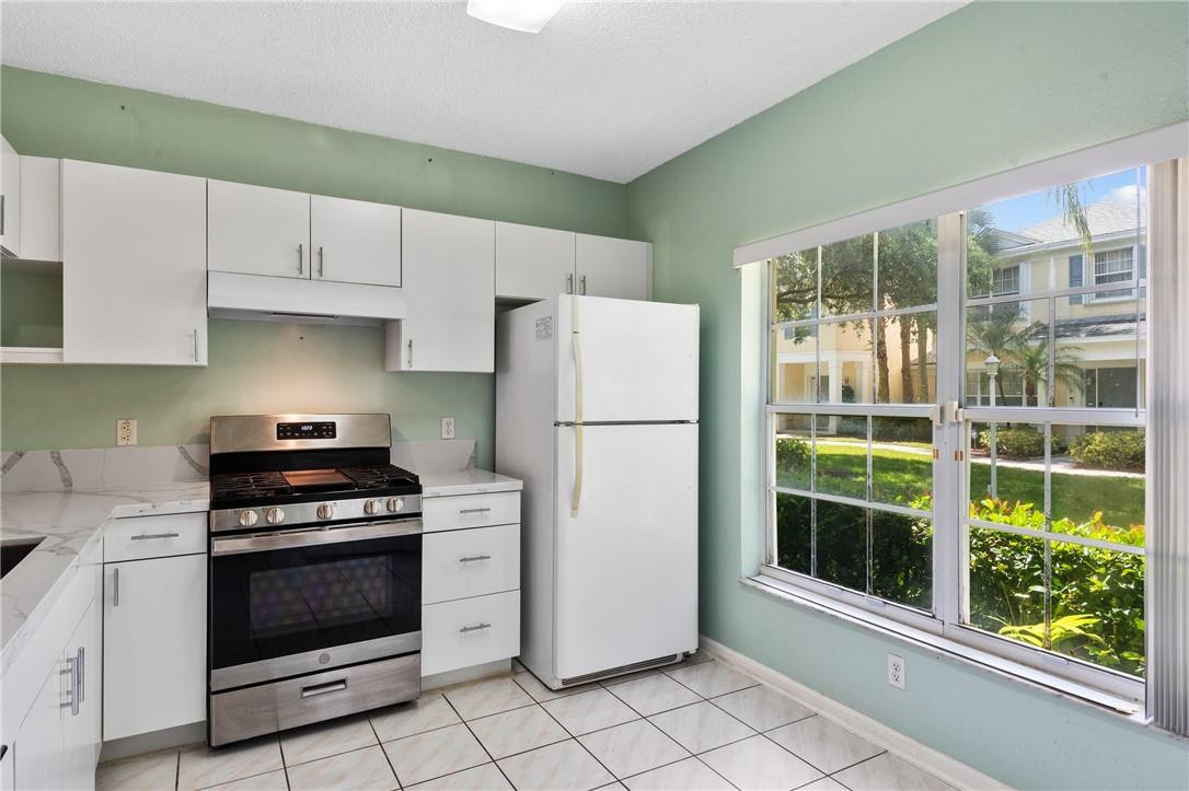 11030 Palm Ridge Lane, Unit 17 Tamarac, FL 33321 - Photo 2 of 32 Kitchen with large window