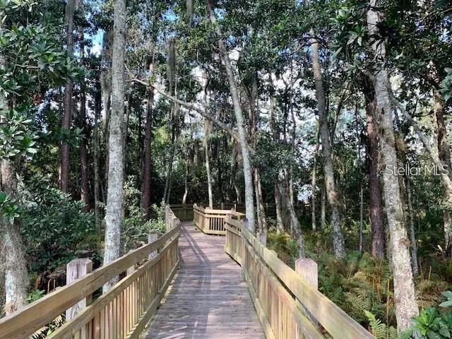 a view of balcony and yard