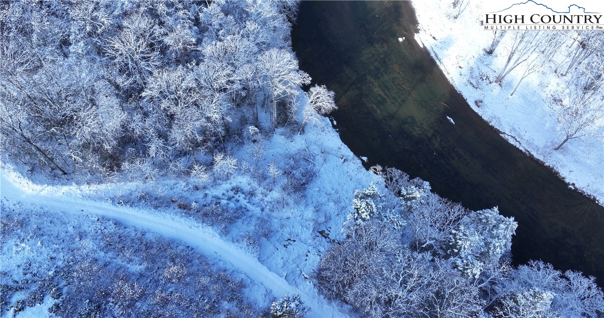 53 Autumn Leaf Way Crumpler, NC 28617 - Photo 24 of 34 a view of a dry back yard of a house