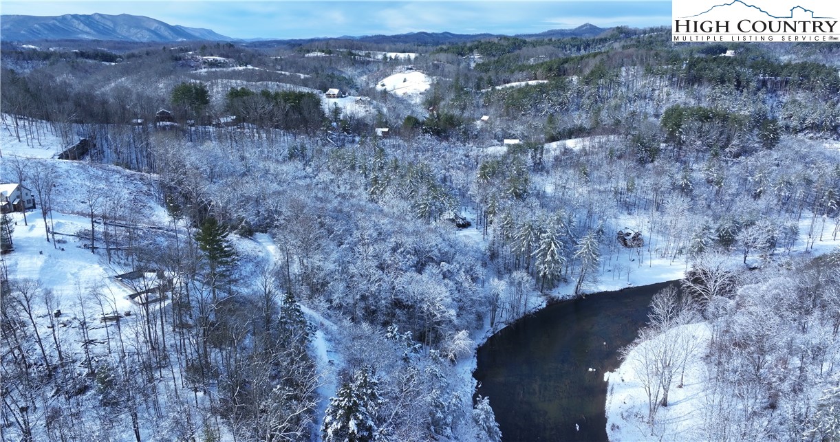 53 Autumn Leaf Way Crumpler, NC 28617 - Photo 25 of 34 a view of a dry yard