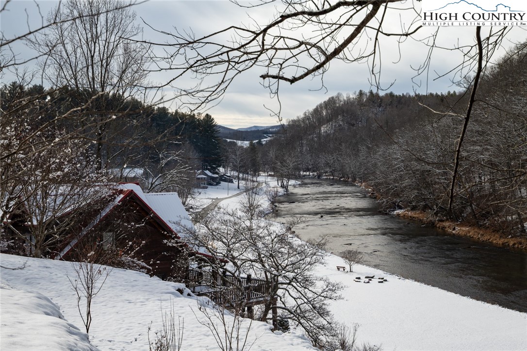 53 Autumn Leaf Way Crumpler, NC 28617 - Photo 10 of 34 a view of a yard covered with snow