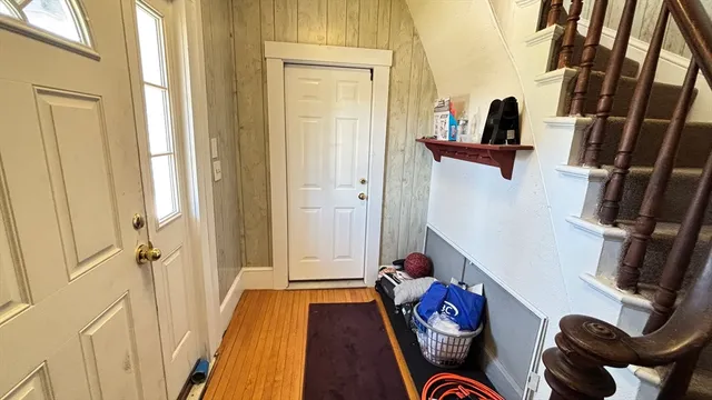 a living room with furniture and a closet