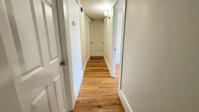 a kitchen with a sink cabinets and appliances