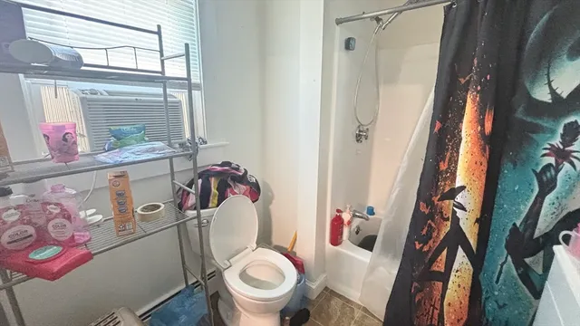 a kitchen with stainless steel appliances a stove a sink and a refrigerator