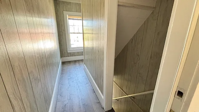 a kitchen with stainless steel appliances granite countertop a refrigerator microwave and sink