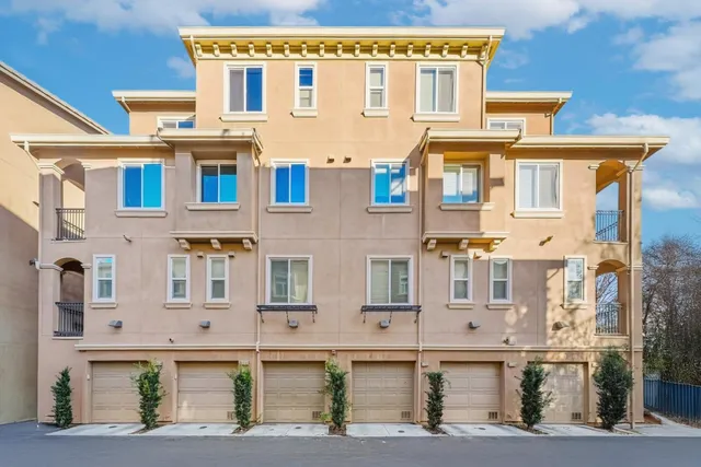 a picture of a bathroom with a refrigerator