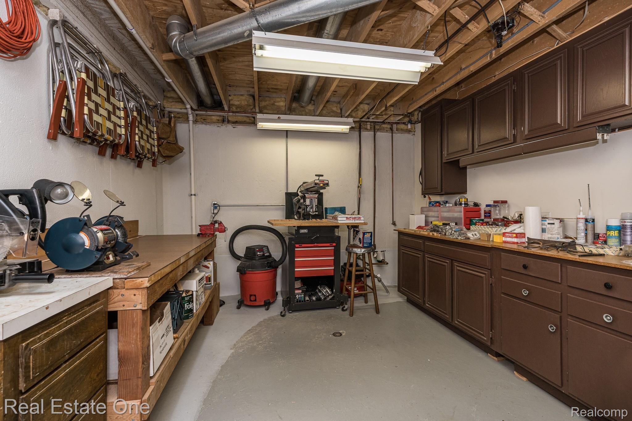3449 Summit Ridge Drive Rochester, MI 48306 - Photo 39 of 44 Workshop area in basement