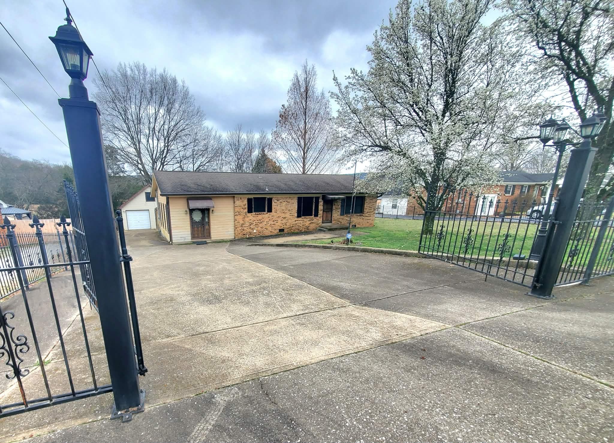 a view of a building with a yard