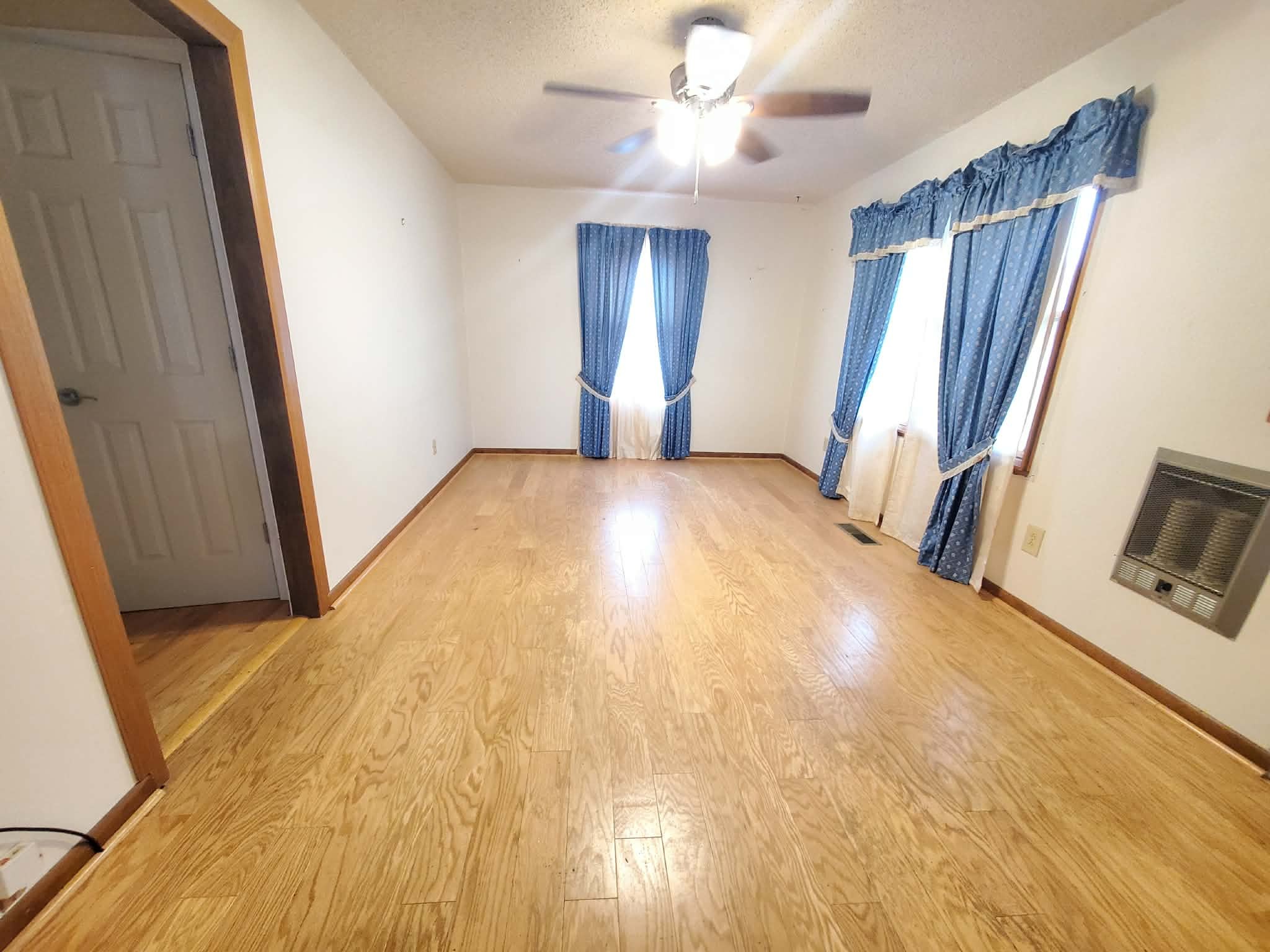 18 Roberts Lane Lebanon, TN 37087 - Photo 19 of 34 a view of an empty room with wooden floor and a window