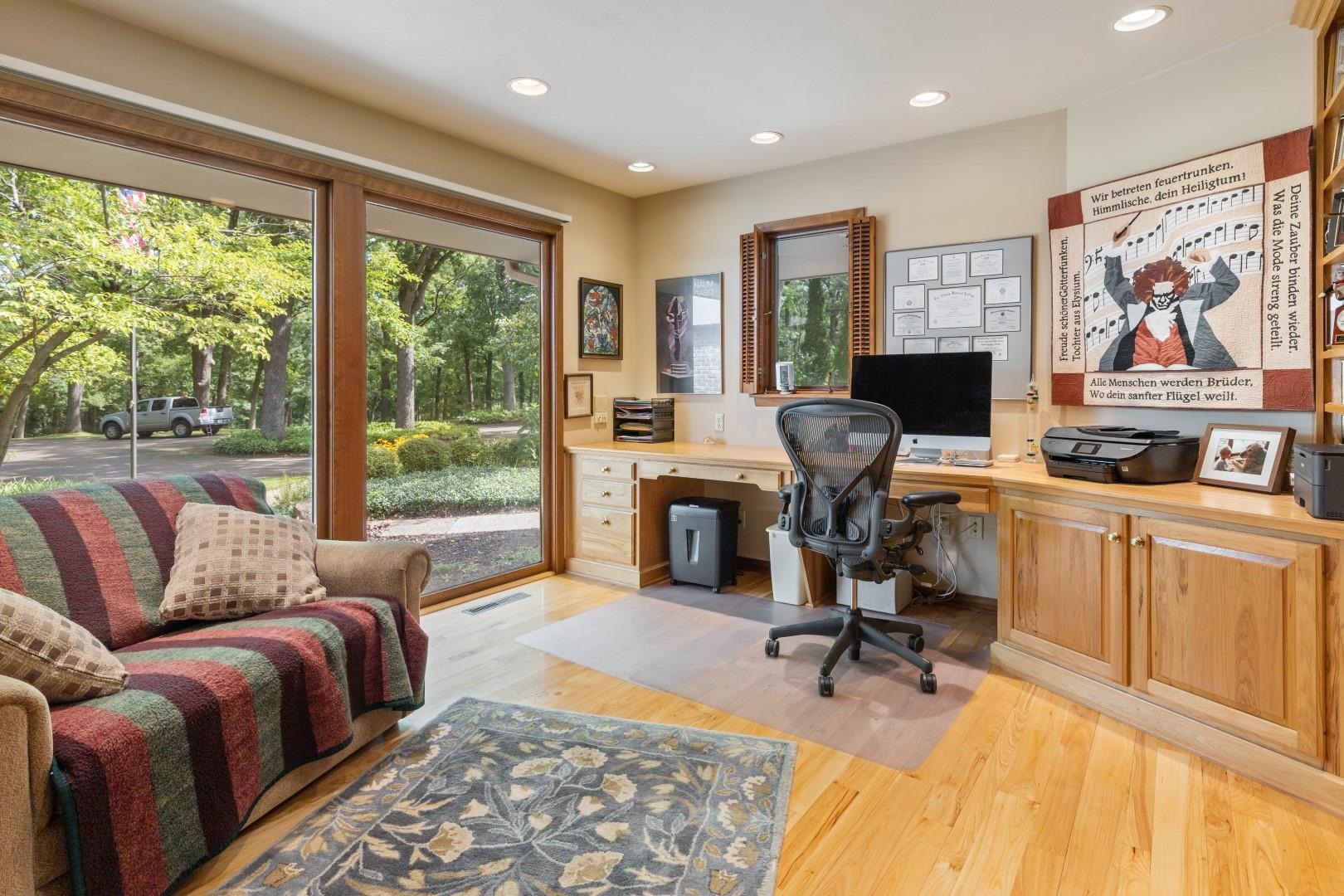 6351 Harlem Road Loves Park, IL 61111 - Photo 24 of 74 a view of a livingroom with workspace and a window