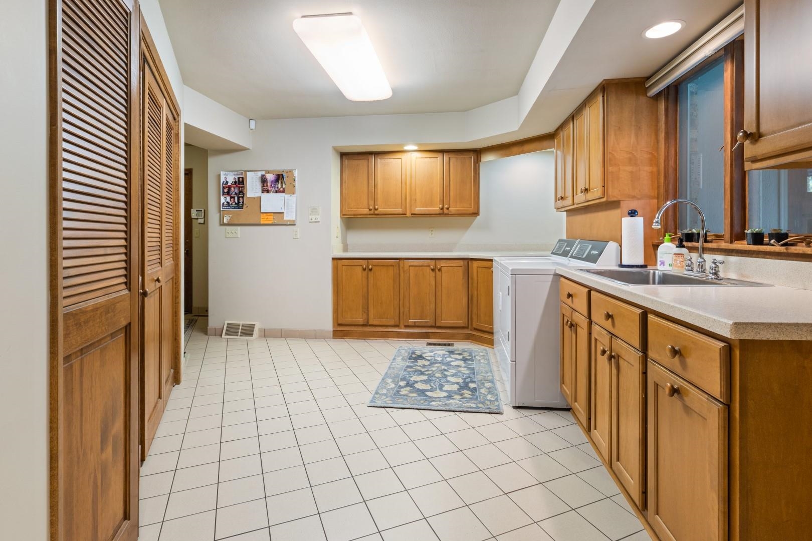 6351 Harlem Road Loves Park, IL 61111 - Photo 26 of 74 a kitchen with stainless steel appliances a sink stove and cabinets