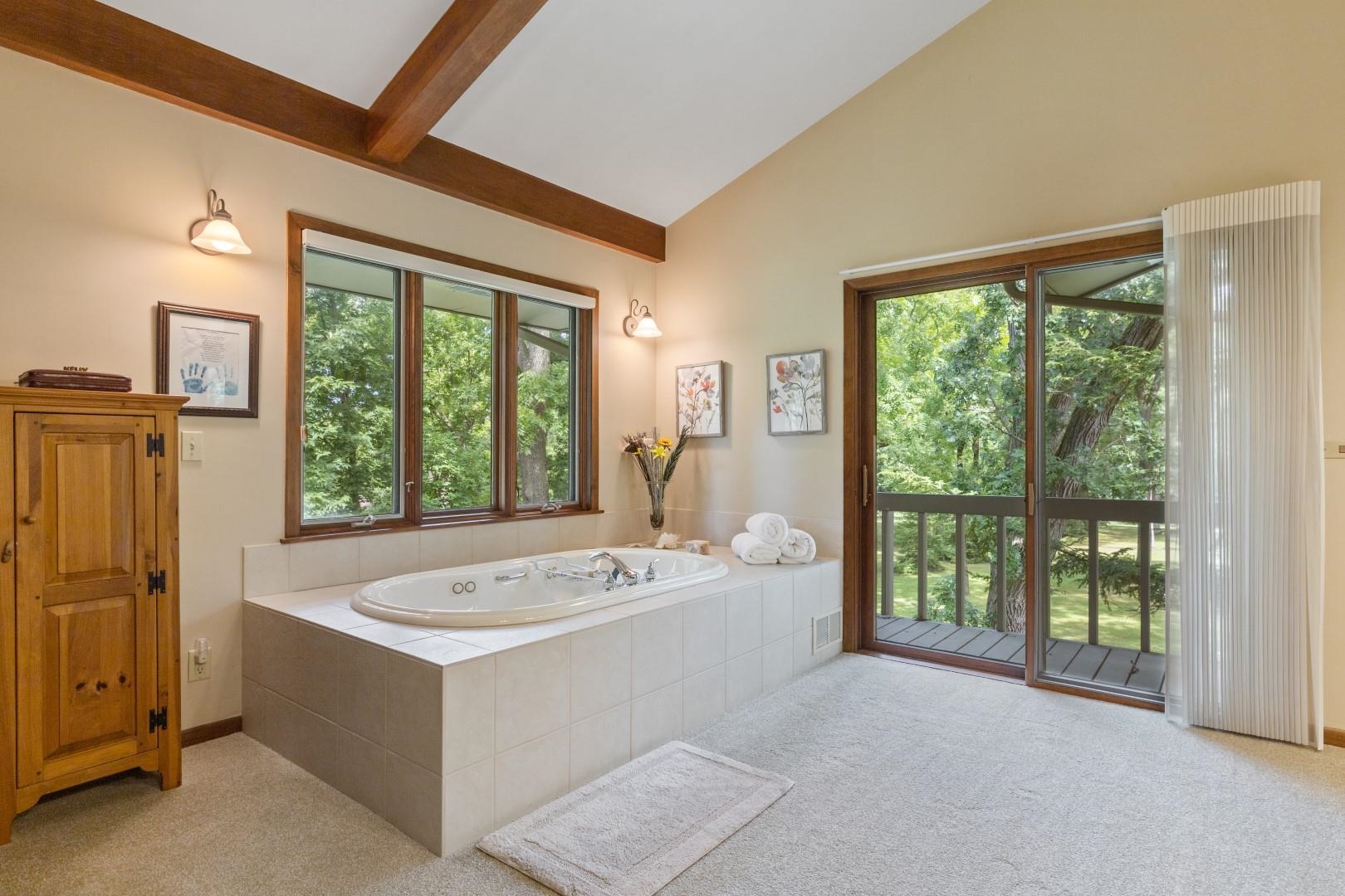 6351 Harlem Road Loves Park, IL 61111 - Photo 33 of 74 a bathroom with a bathtub and a sink