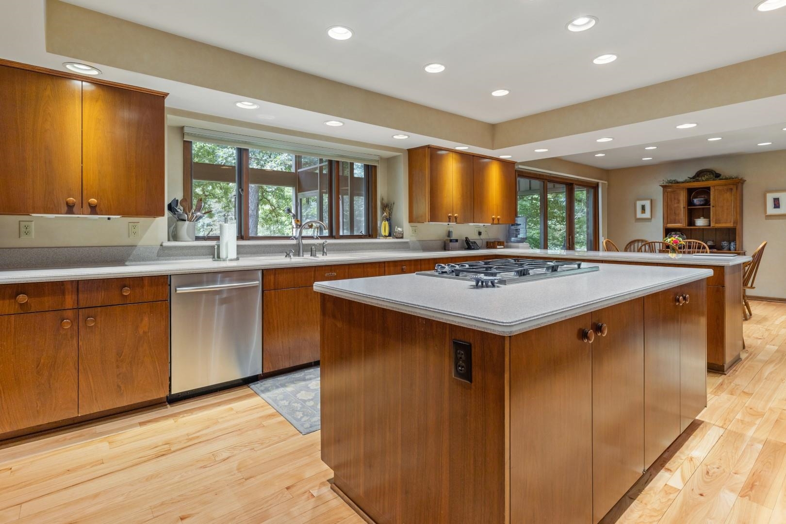 6351 Harlem Road Loves Park, IL 61111 - Photo 4 of 74 a kitchen with a stove sink and cabinets