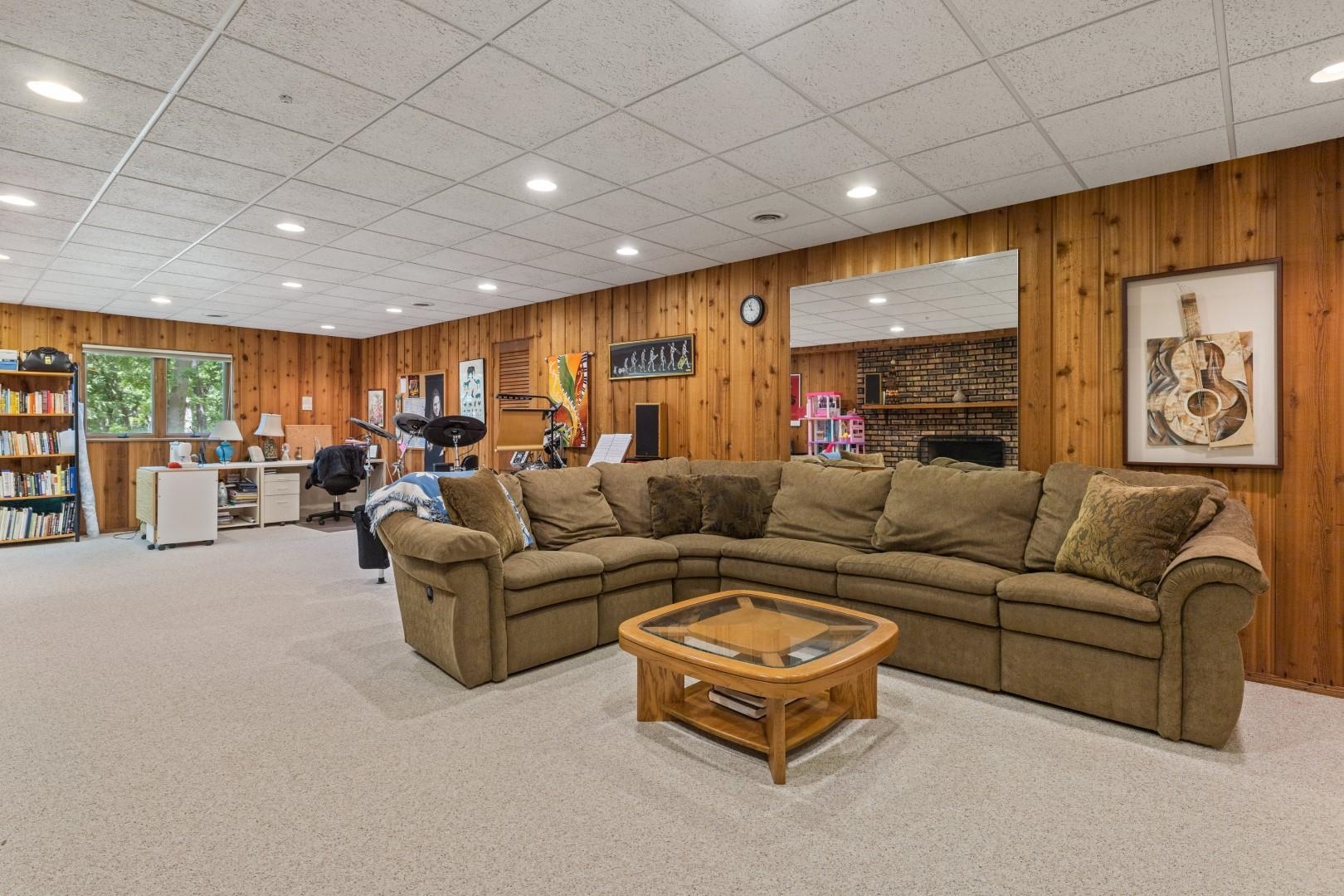 6351 Harlem Road Loves Park, IL 61111 - Photo 43 of 74 a living room with furniture a couch and ceiling fan