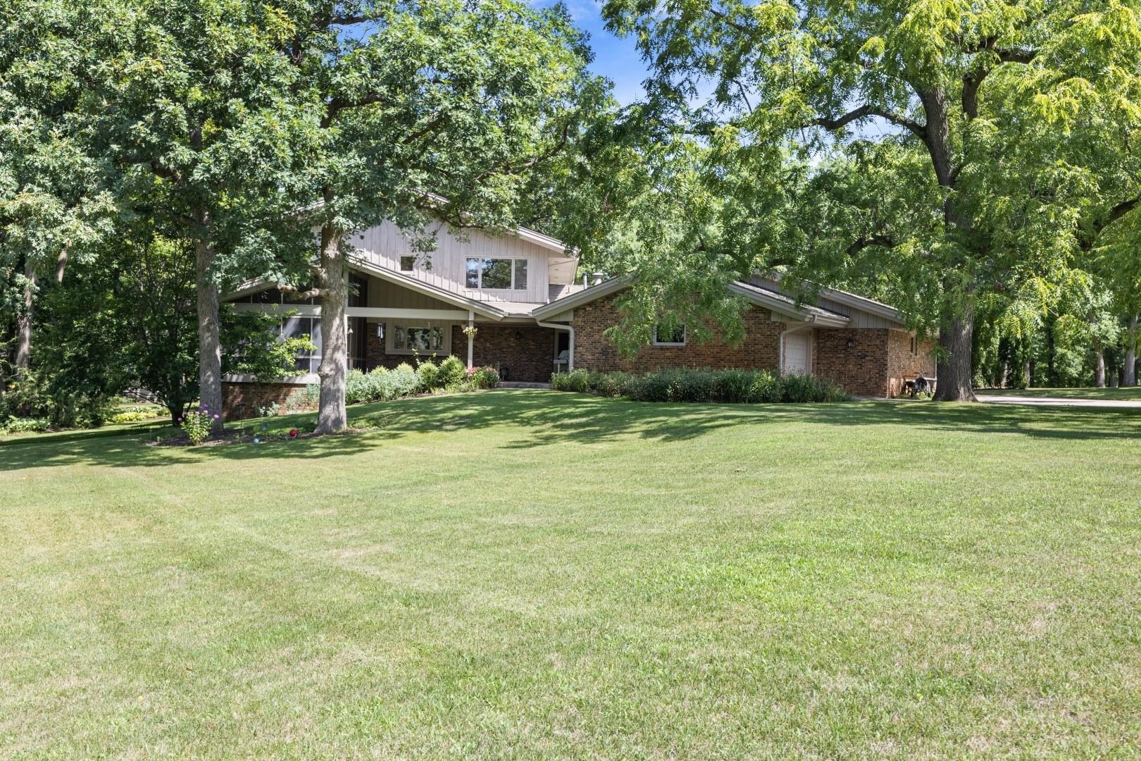 6351 Harlem Road Loves Park, IL 61111 - Photo 55 of 74 a front view of a house with a yard