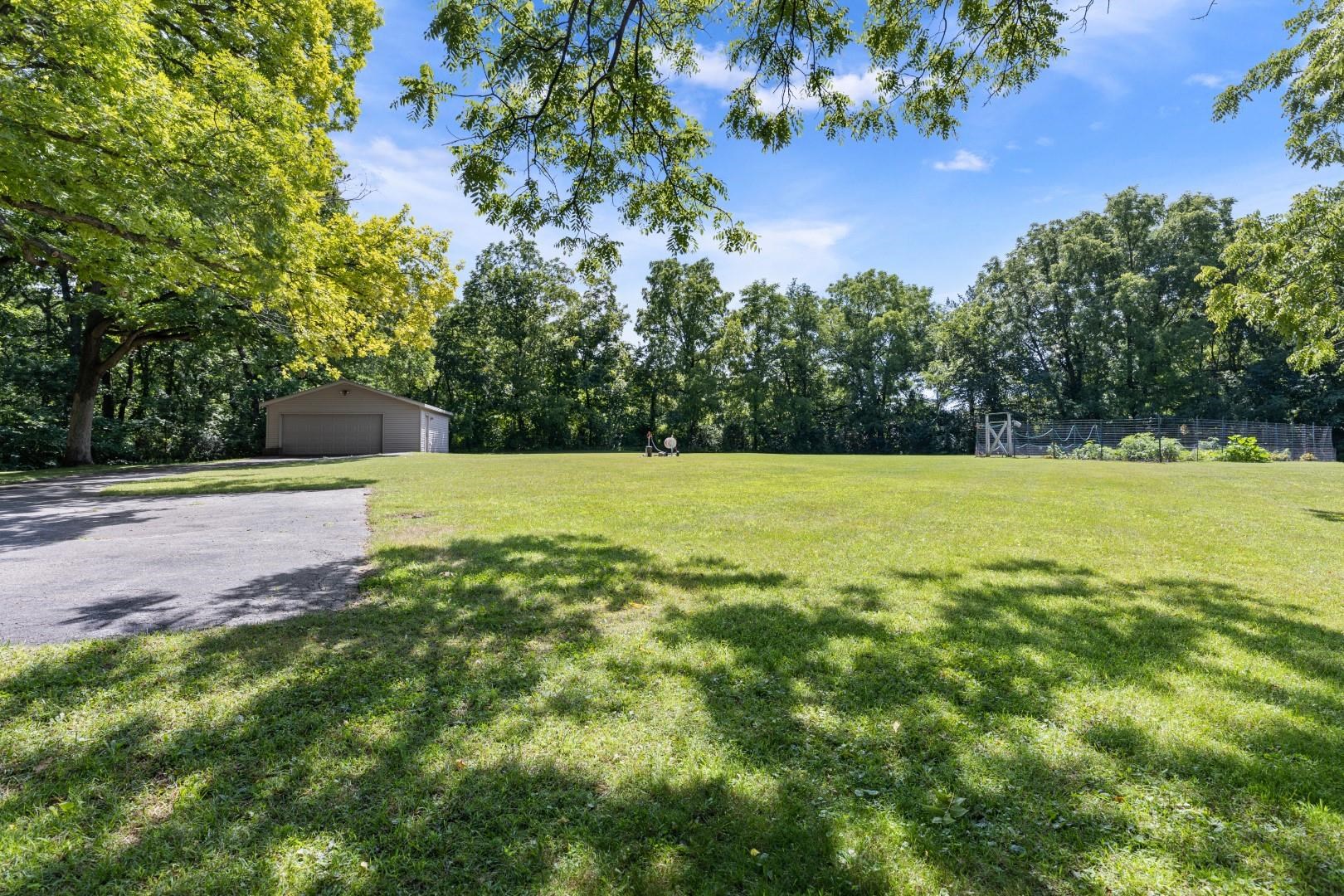 6351 Harlem Road Loves Park, IL 61111 - Photo 58 of 74 a view of a pool with a yard