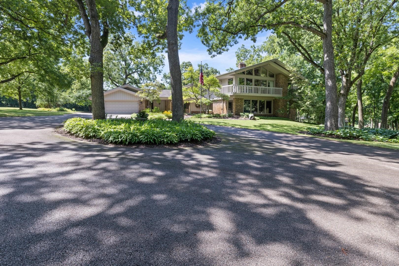 6351 Harlem Road Loves Park, IL 61111 - Photo 61 of 74 a view of a large trees in front of a house