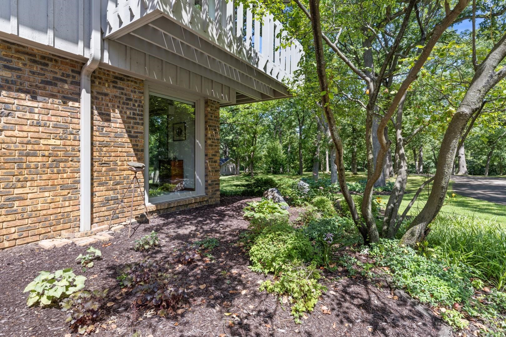 6351 Harlem Road Loves Park, IL 61111 - Photo 65 of 74 a backyard of a house with lots of green space