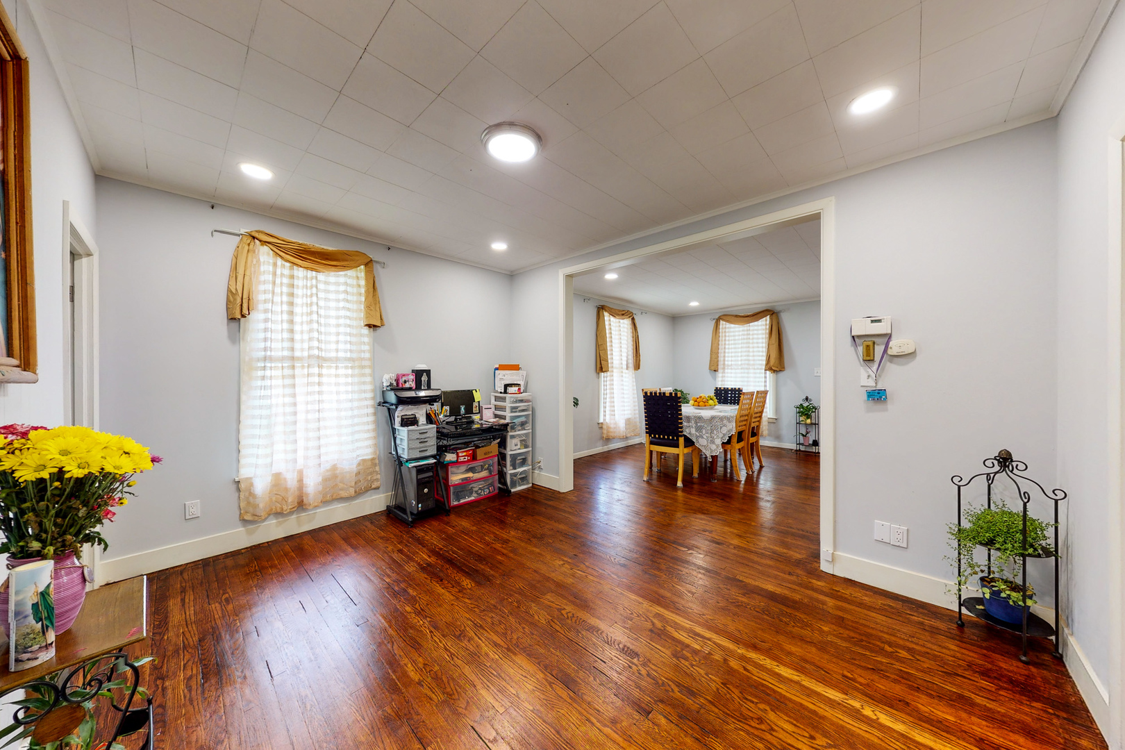 658 Linden Avenue Elgin, IL 60120 - Photo 12 of 28 a living room with furniture and a wooden floor