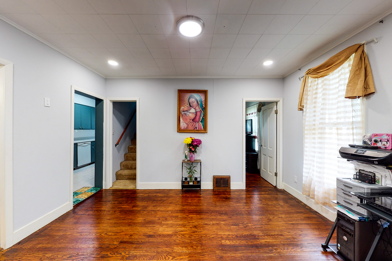 658 Linden Avenue Elgin, IL 60120 - Photo 13 of 28 a view of a living room with furniture and wooden floor