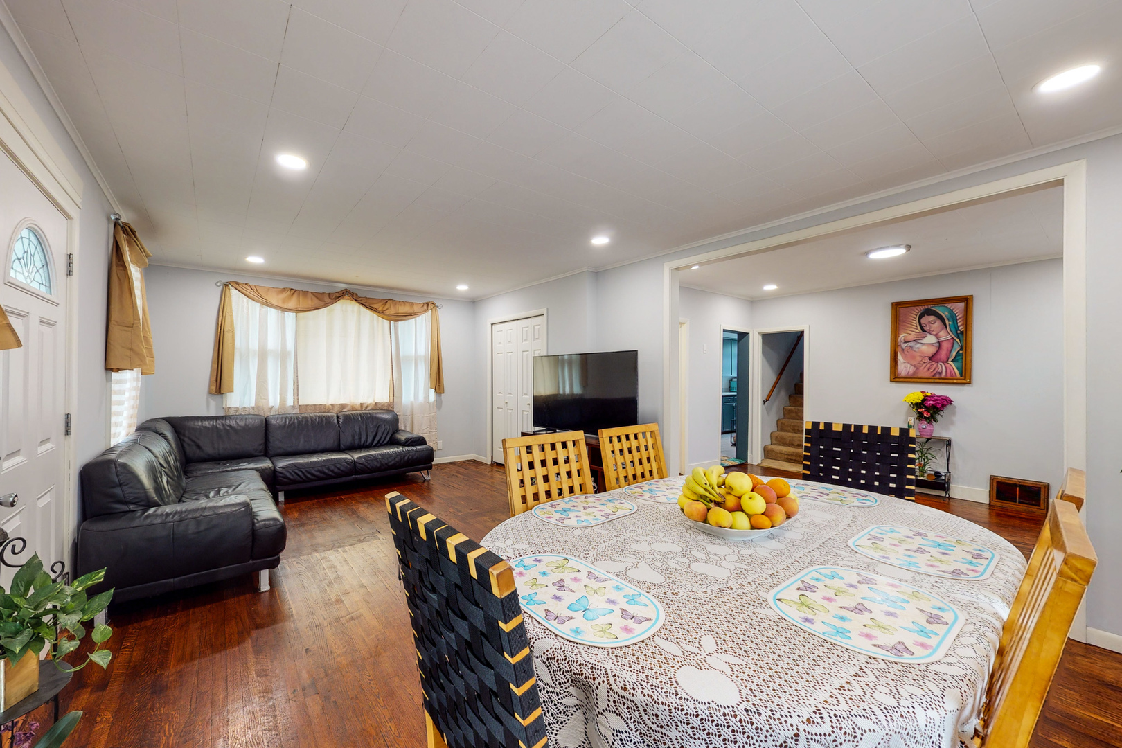 658 Linden Avenue Elgin, IL 60120 - Photo 10 of 28 a bed room with furniture and a wooden floor