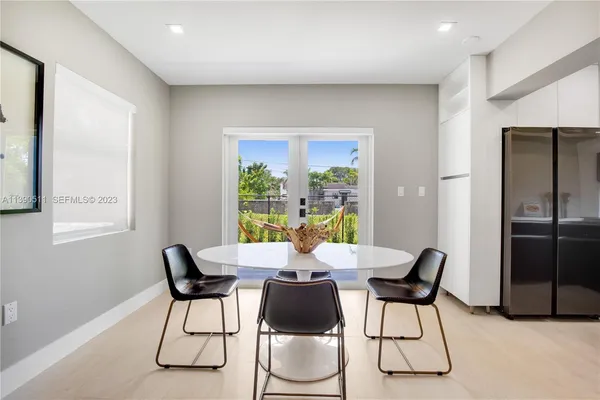 a view of a dining room with furniture