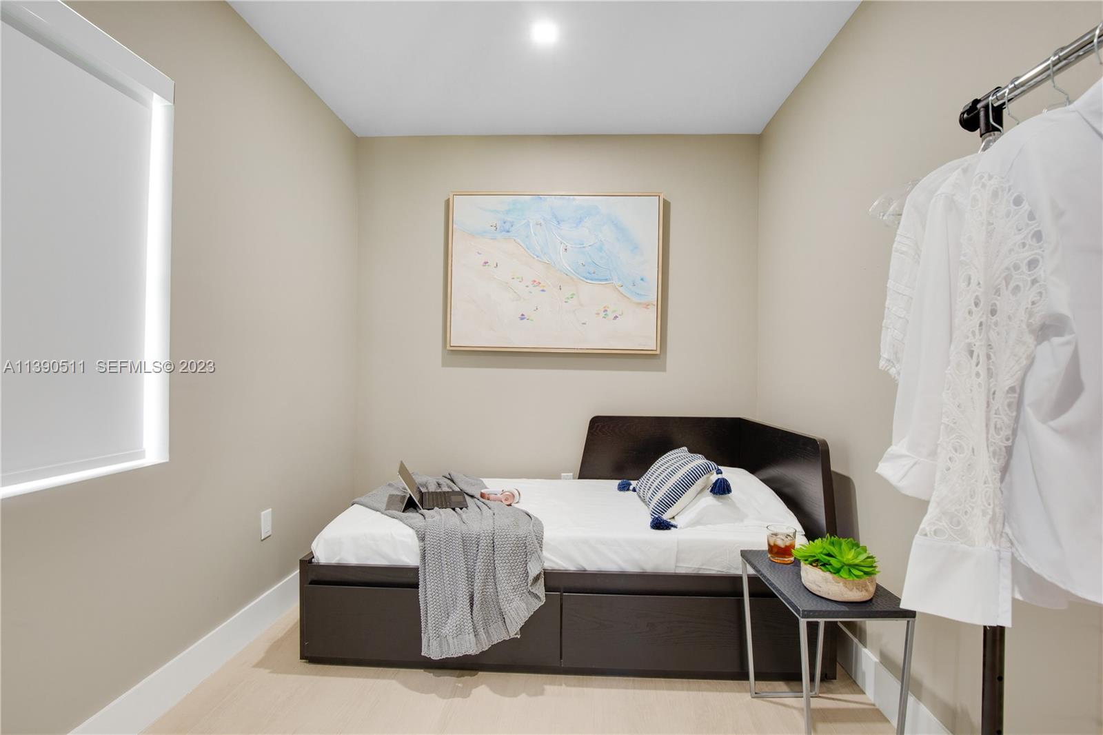 6428 Southwest 23rd Street, Unit 6428 Miami, FL 33155 - Photo 22 of 35 a living room with furniture and a potted plant