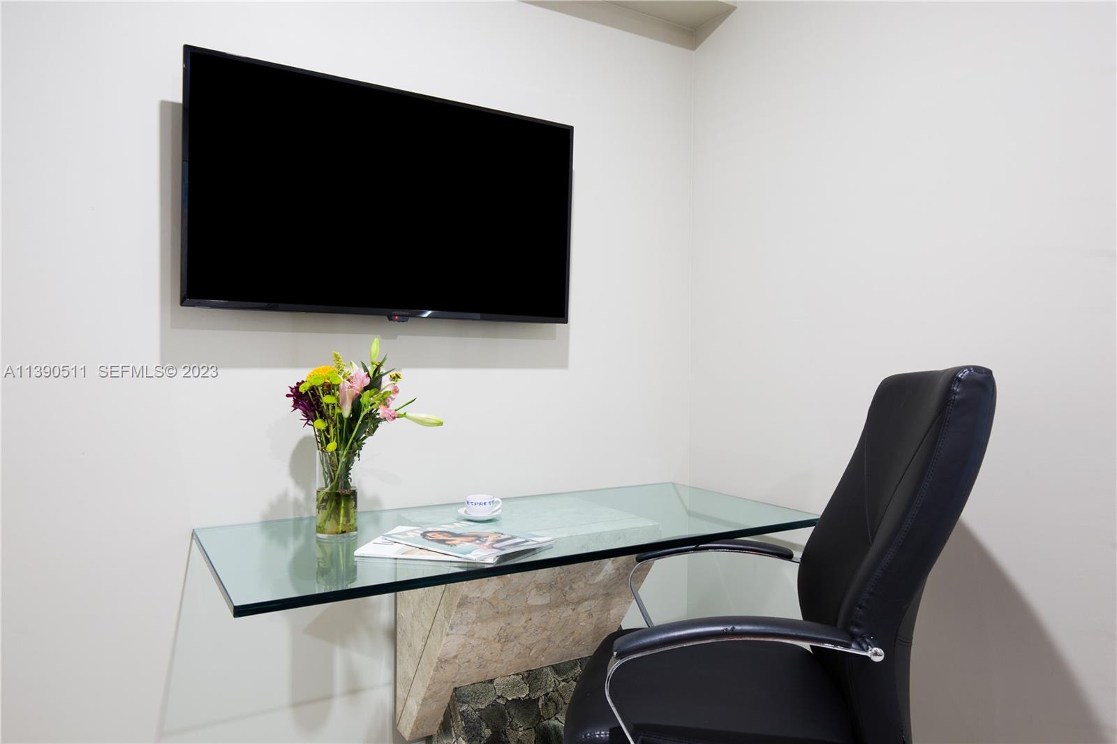 6428 Southwest 23rd Street, Unit 6428 Miami, FL 33155 - Photo 27 of 35 a view of a workspace