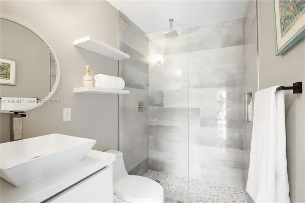 a close view of a utility room with washer and dryer