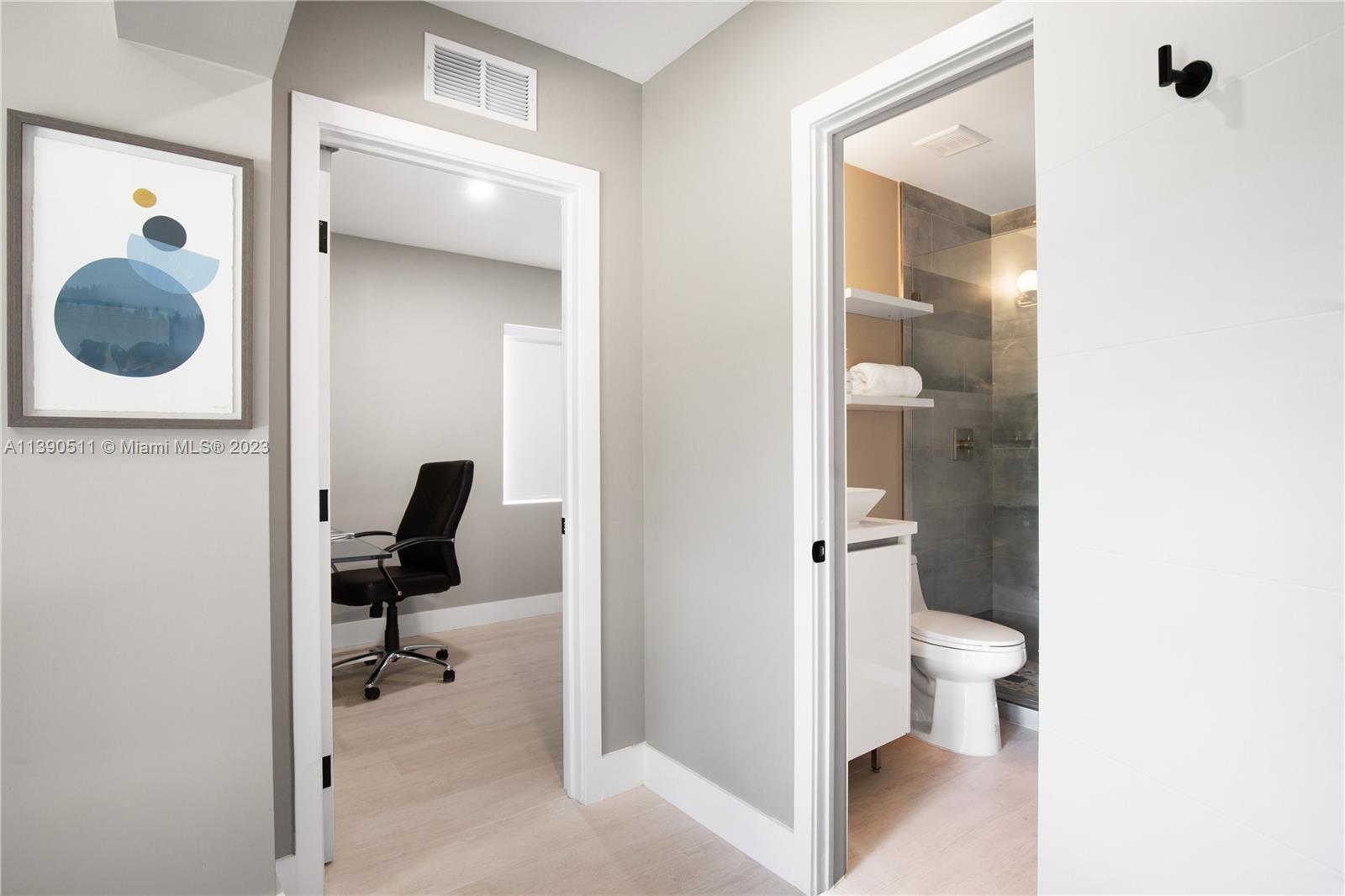 6428 Southwest 23rd Street, Unit 6428 Miami, FL 33155 - Photo 30 of 35 a bathroom with a toilet and a shower