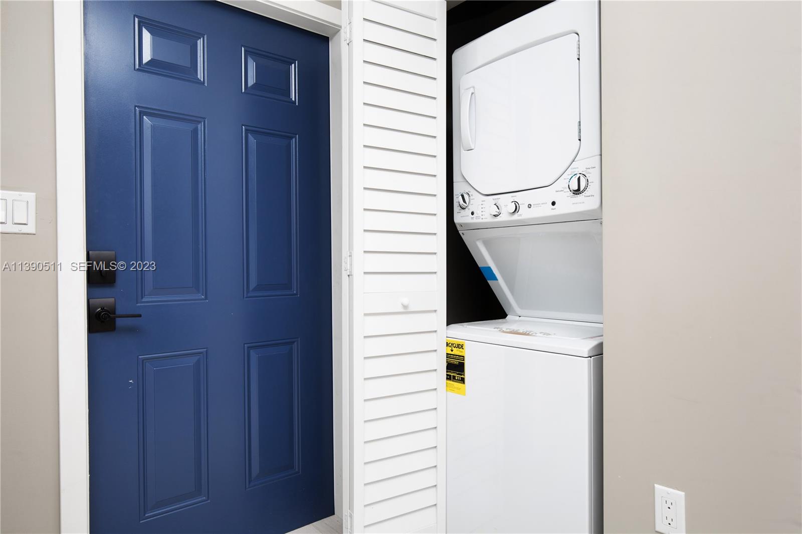 6428 Southwest 23rd Street, Unit 6428 Miami, FL 33155 - Photo 31 of 35 a close view of a utility room with washer and dryer