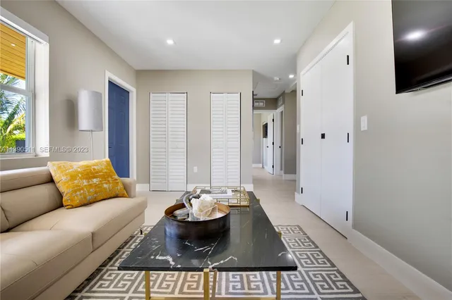 a living room with furniture and a couch