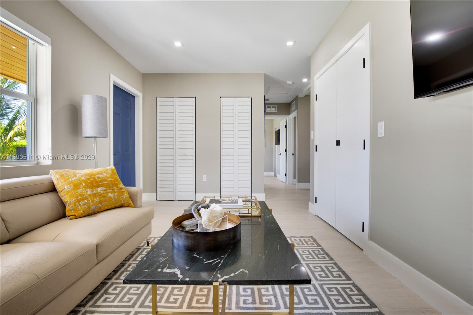 6428 Southwest 23rd Street, Unit 6428 Miami, FL 33155 - Photo 4 of 35 a living room with furniture and a rug