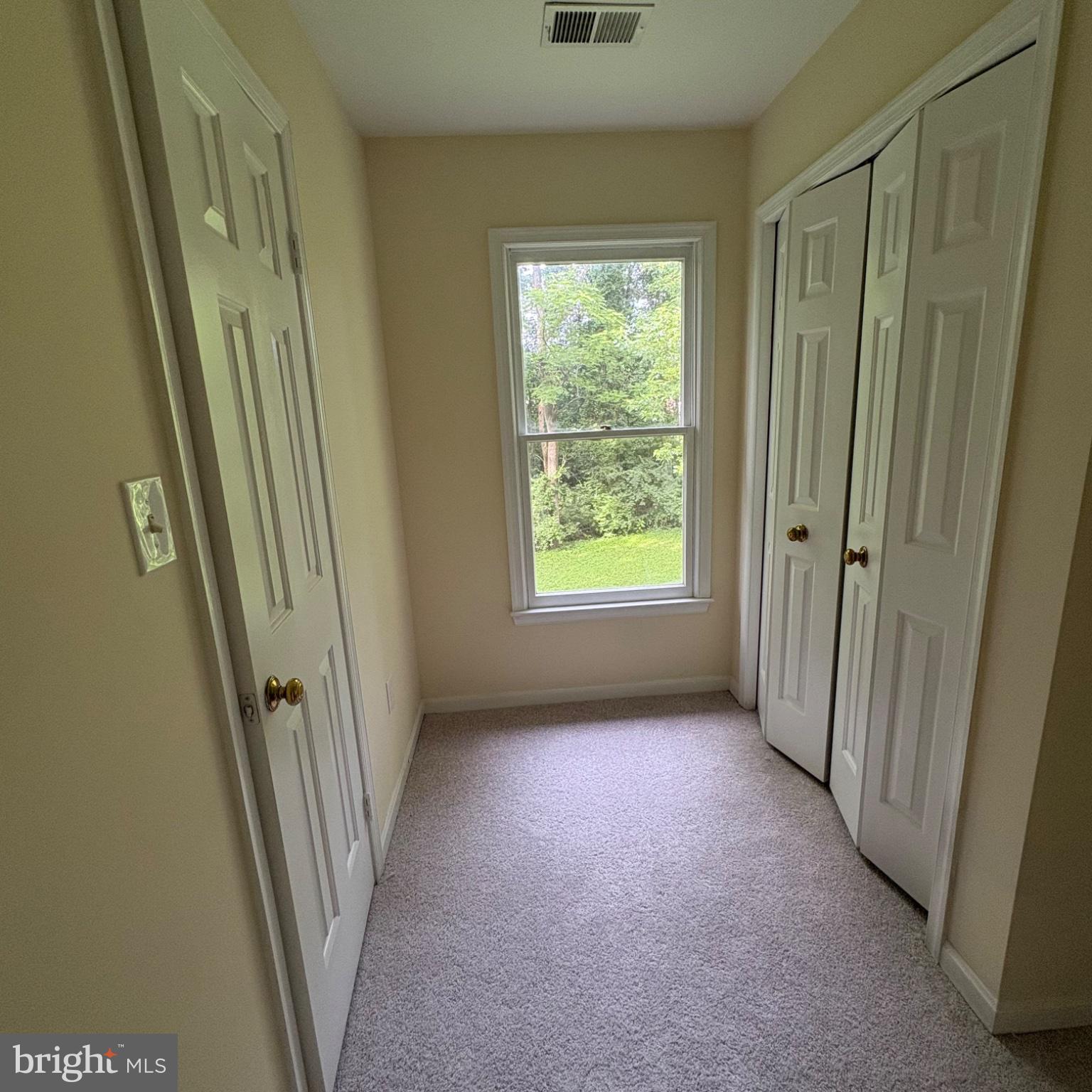 3502 Holly Road Annandale, VA 22003 - Photo 24 of 57 an empty room with a window